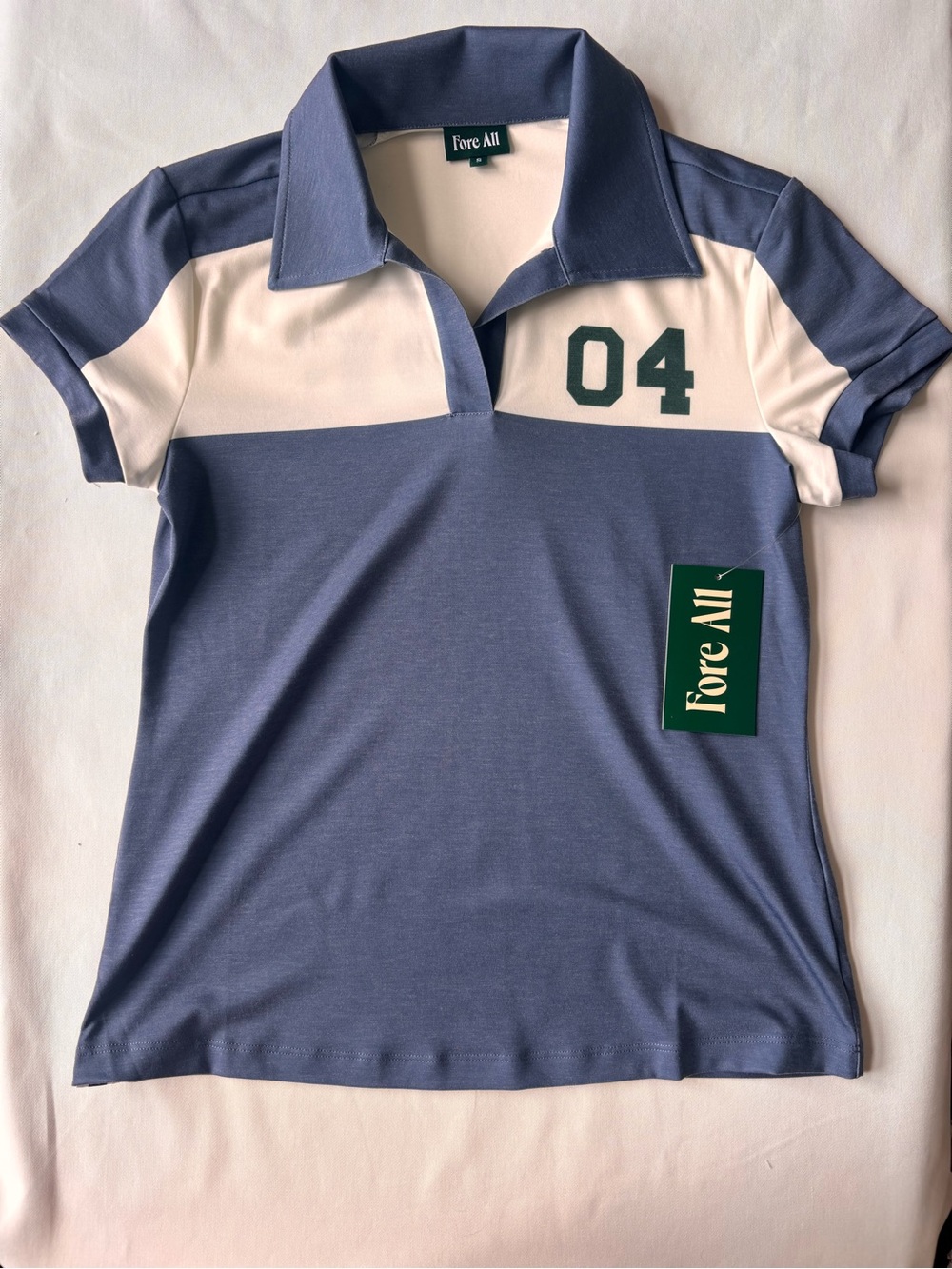 Fore All Women's Blue and White Polo Jersey with '04' Athletic Detail